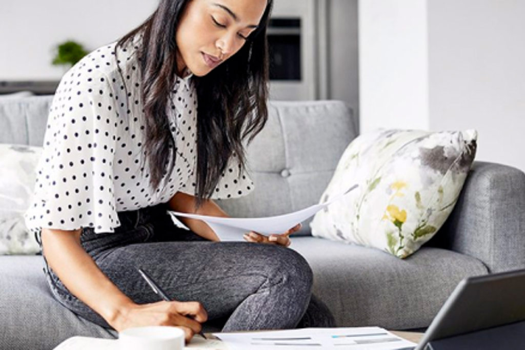 girl working on couch